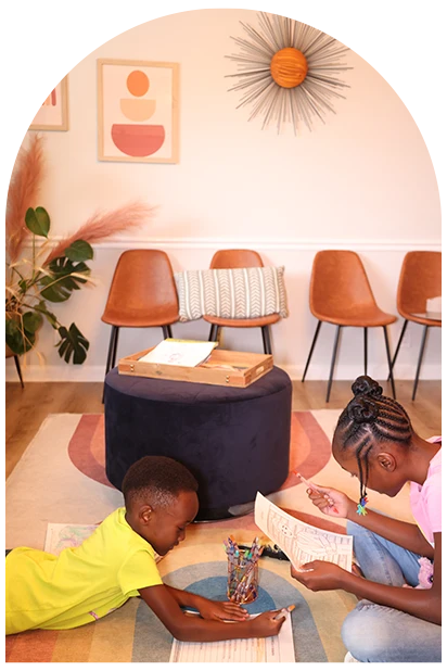 Children enjoying the welcoming Hand & Heart Chiropractic office