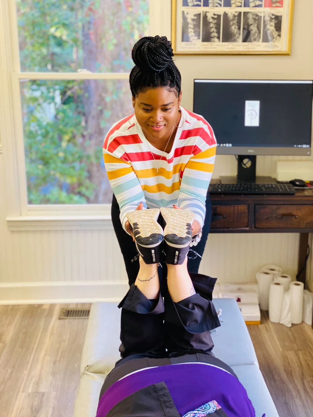 Chiropractor Snellville GA Dionne Anderson Performing TRT On Patient